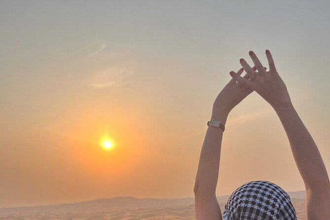 Half Day Desert Safari with Sand Boarding and Camel Ride - Sandboarding on the dunes