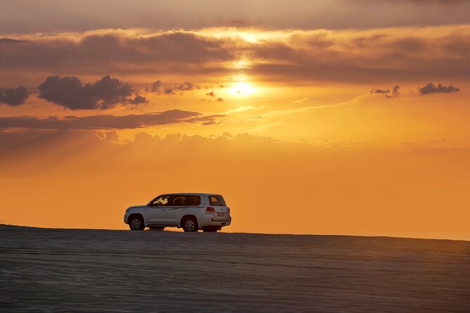 Private Desert Safari Fast Track - Sandboarding adds a simple second thrill