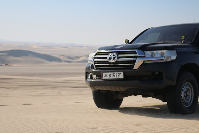 Private Desert Safari Tour 4 hours - Sandboarding on Qatar’s golden dunes