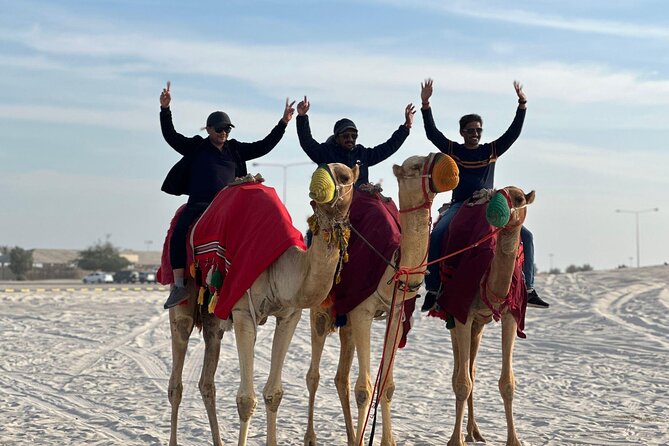 Private Sealine Beach Tour with Desert Activities - Camel riding adds a slower desert stop