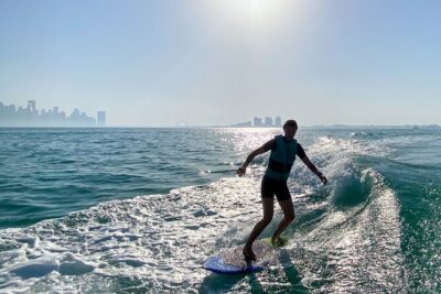 Private Wakesurfing or Wakeboarding along Doha’s skyline