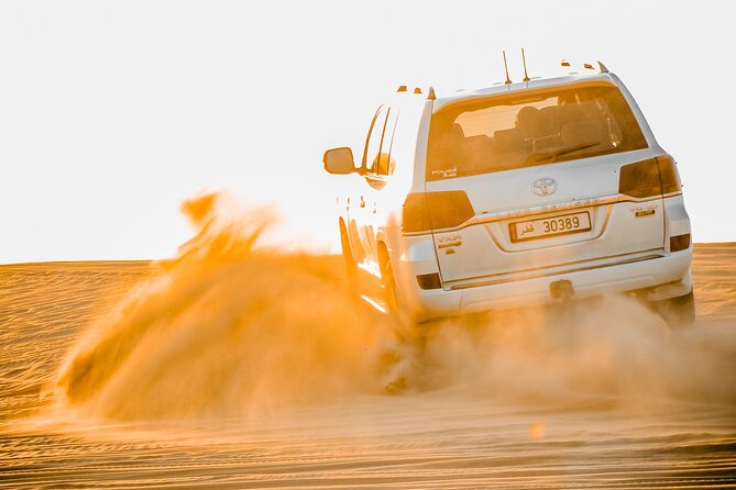 Qatar: Sunrise or Sunset Desert Tour in Doha, unforgettable trip - Leaving Doha in an air-conditioned 4x4