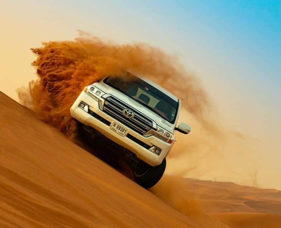 Qatar: Sunset Desert Safari with Camel Ride & Sandboarding - What the $15 price really gives you