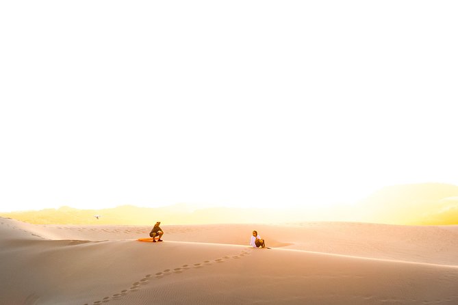 Sunrise Desert Safari in Qatar: An Unforgettable Adventure - Sandboarding With the Right Footwear