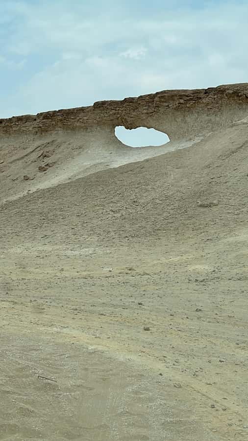 West Qatar tour to Richard Sierra sculpture,Umbrella Rock - Walking through Richard Serra’s desert sculpture